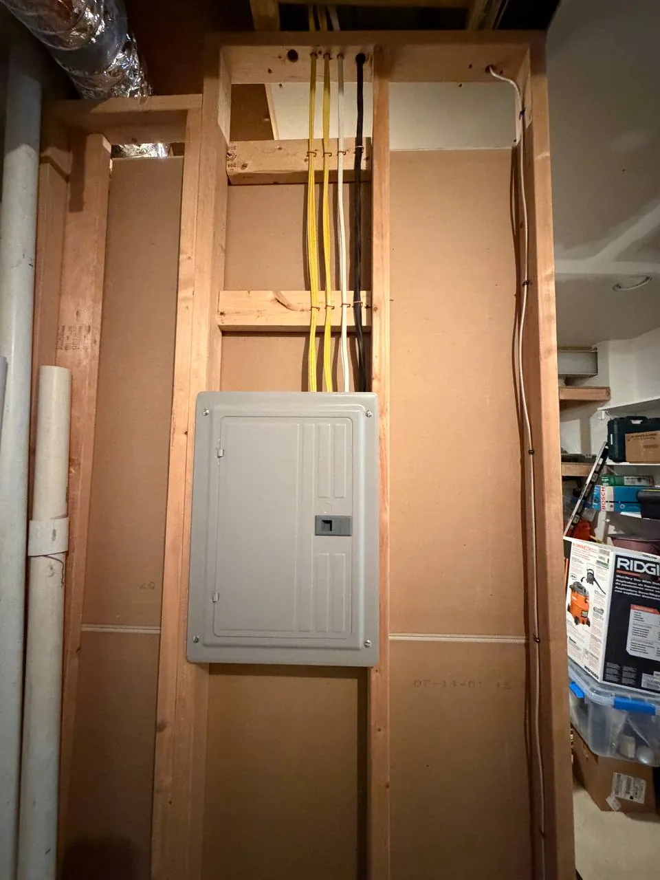 New electrical panel in a framed wall