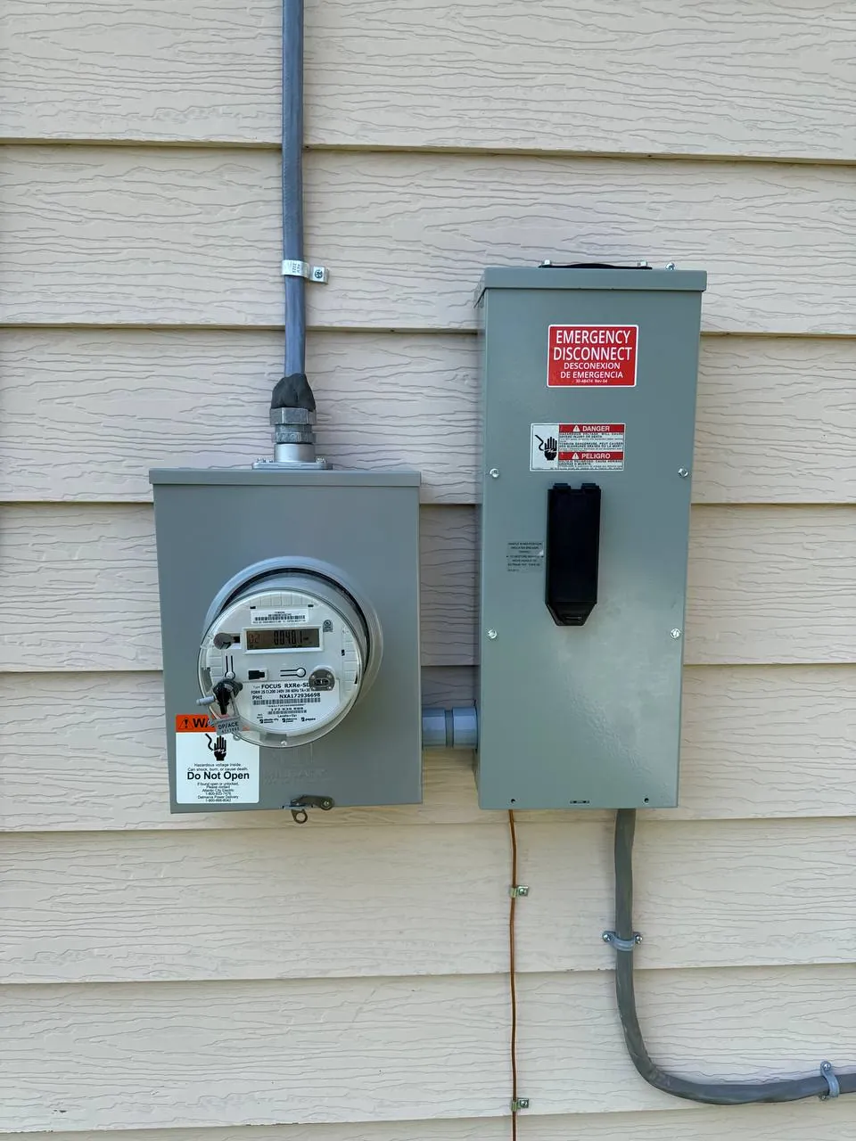 Meter and emergency disconnect on a house
