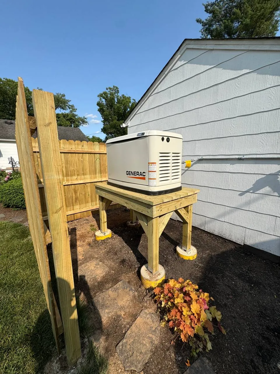 Standby generator on a raised platform