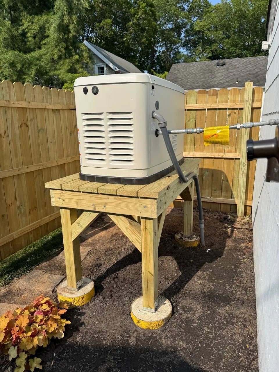 Generac generator on a wooden stand