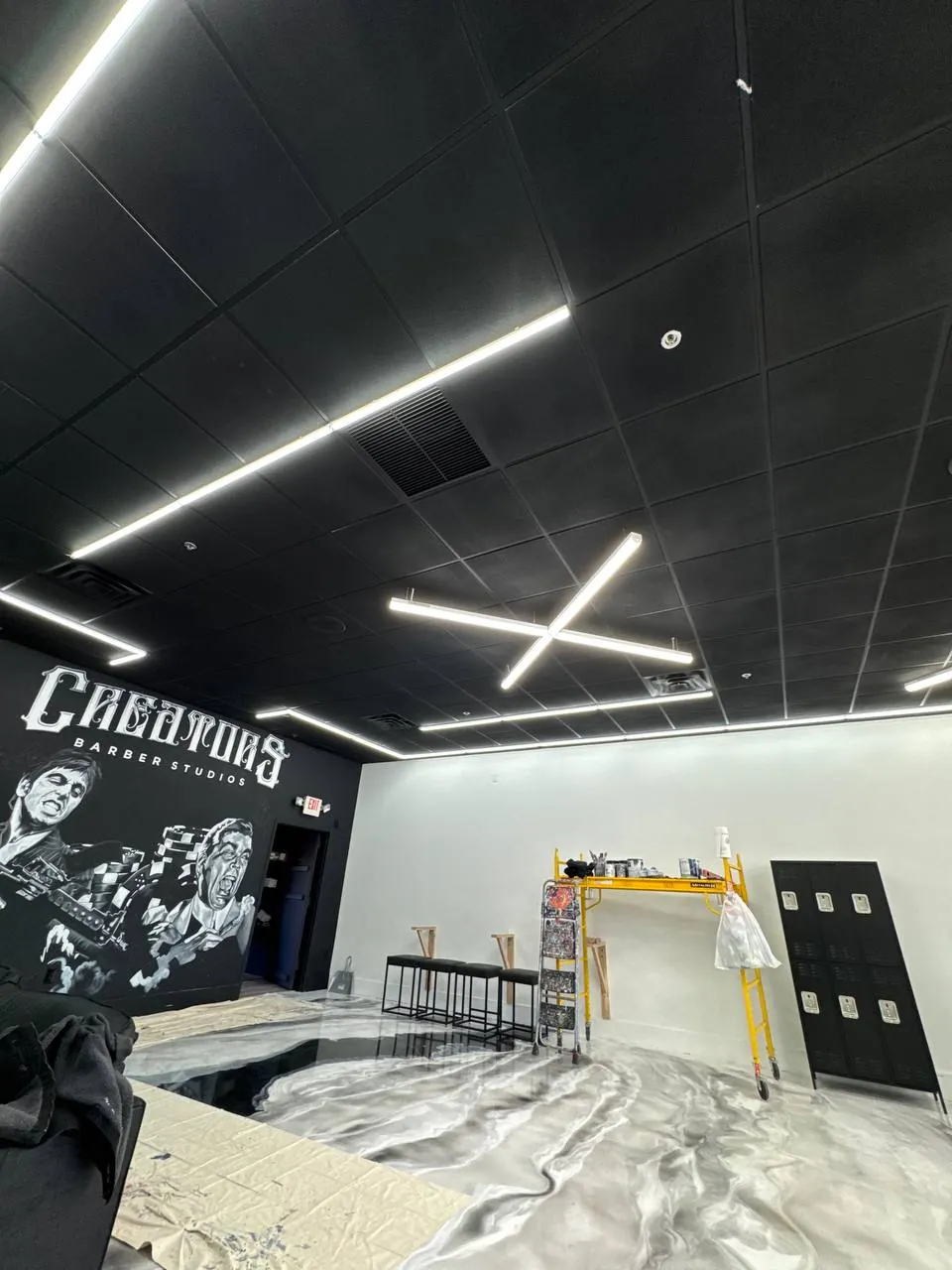 Barber studio with linear LED ceiling lighting