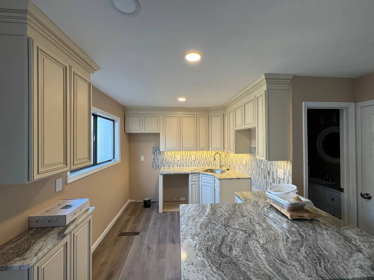 Kitchen with under-cabinet and recessed lighting