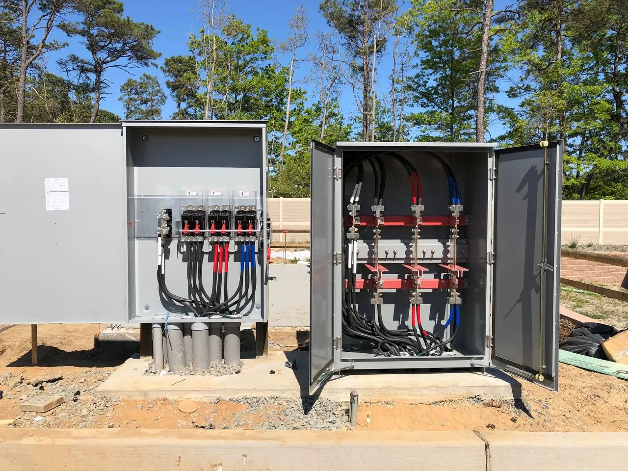 Outdoor switchgear cabinets on a new construction site